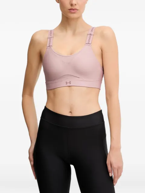 Under Armour sujetador deportivo con tira del logo y panel de malla