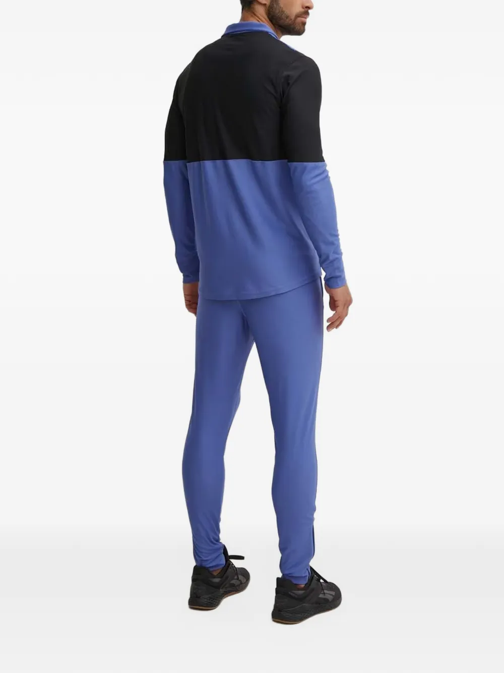 Under Armour Tweedelig trainingspak met colourblocking en logo-print Paars