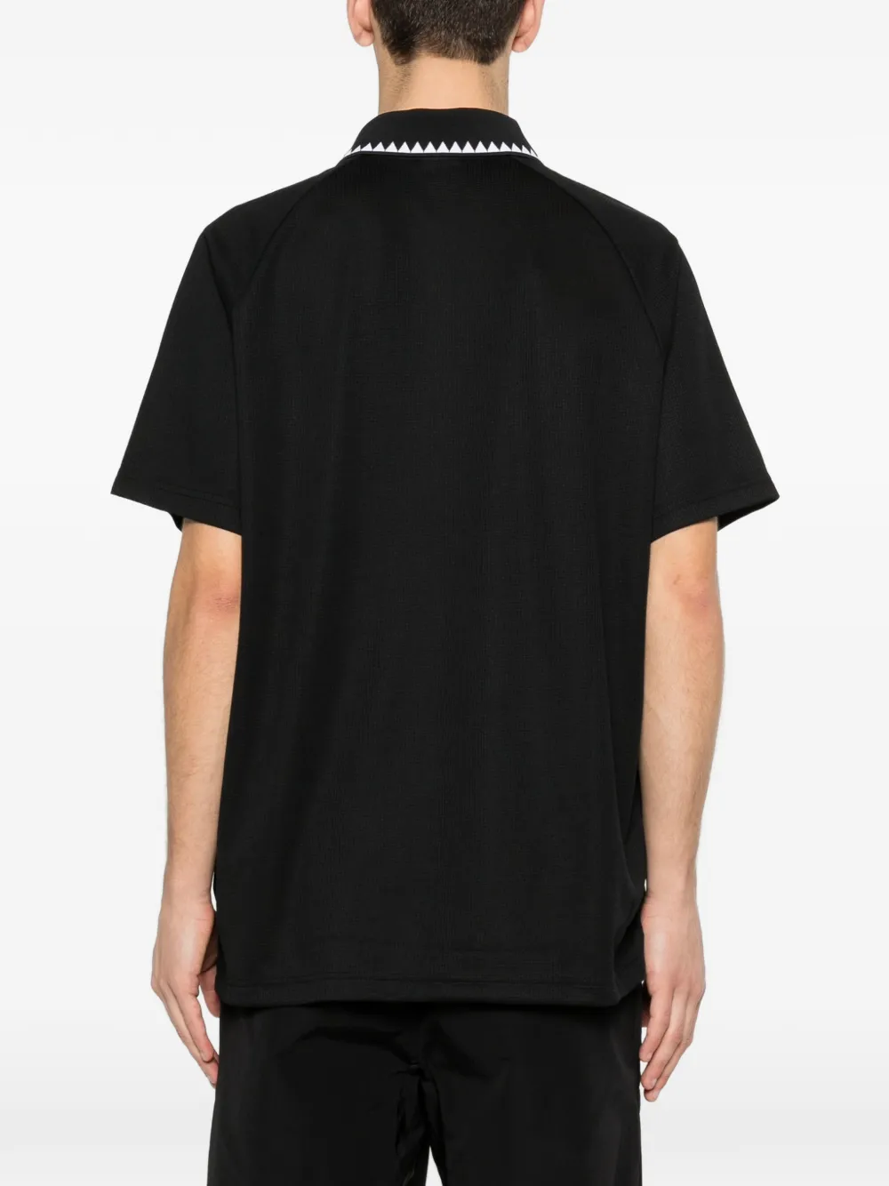 adidas Poloshirt met gestreept detail Zwart