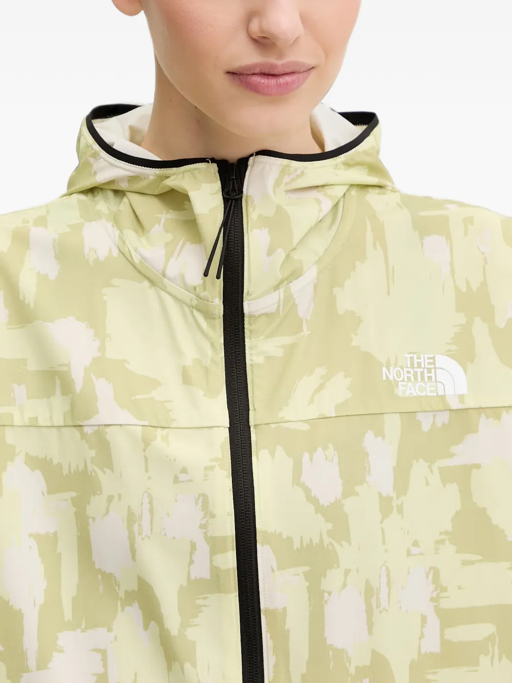 The North Face Mountain Athletics printed hooded wind jacket Groen
