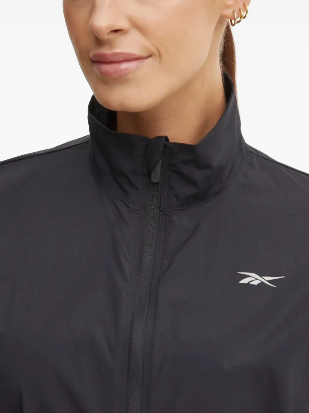 Reebok Speed jack met rits en logoprint Zwart