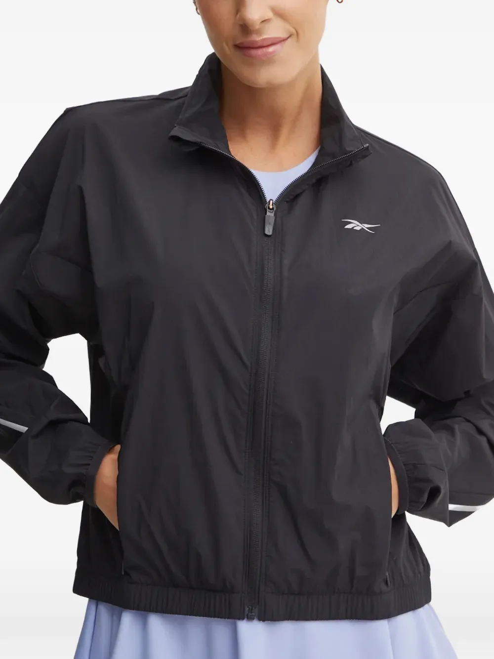 Reebok Speed jack met rits en logoprint Zwart