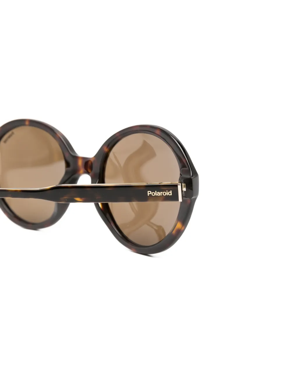 Polaroid Zonnebril met rond montuur en schildpadschild design Bruin