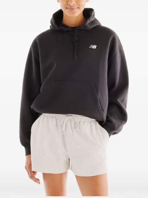 New Balance hoodie con bolsillo canguro
