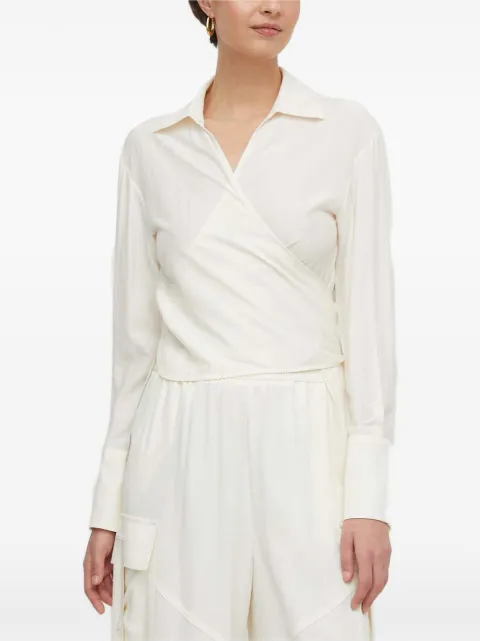 Sisley blusa con diseño cruzado
