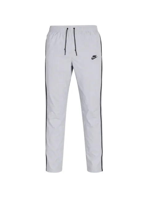 Nike 테크 우븐 리플렉티브 트랙팬츠