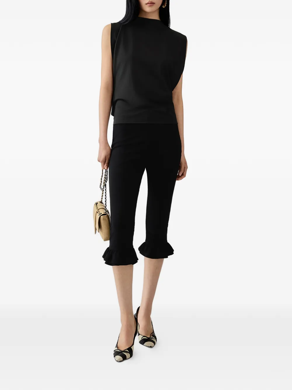 Jacquemus The Moisson blouse met open rug Zwart