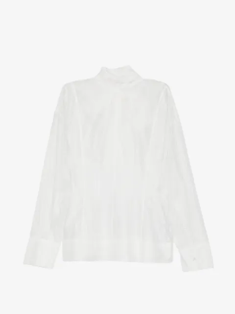 Su blusa con detalle de moño
