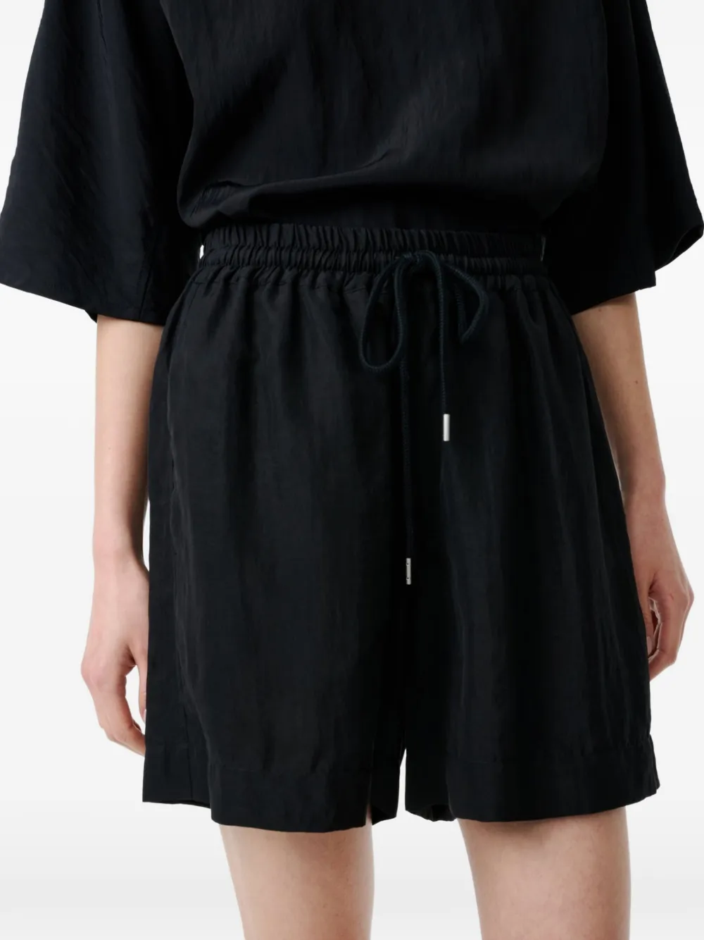 Studio Nicholson Karya elastische shorts Zwart