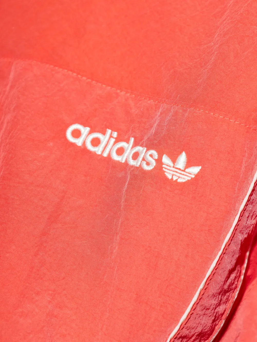 adidas Santiago jack met borduurwerk Oranje