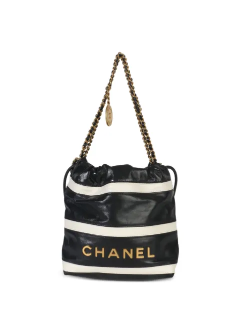 CHANEL Pre-Owned bolso bombonera Chanel 22 mini acolchado a rayas 2021-2025
