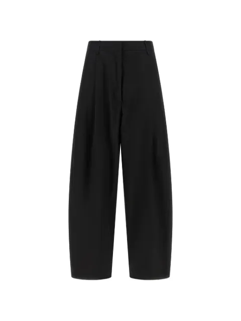 Nude pantalones con diseño curvo