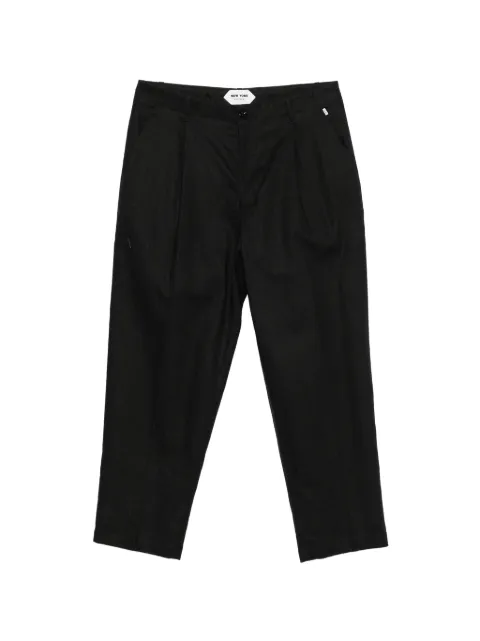 New York Resident Andrew pleated cotton trousers