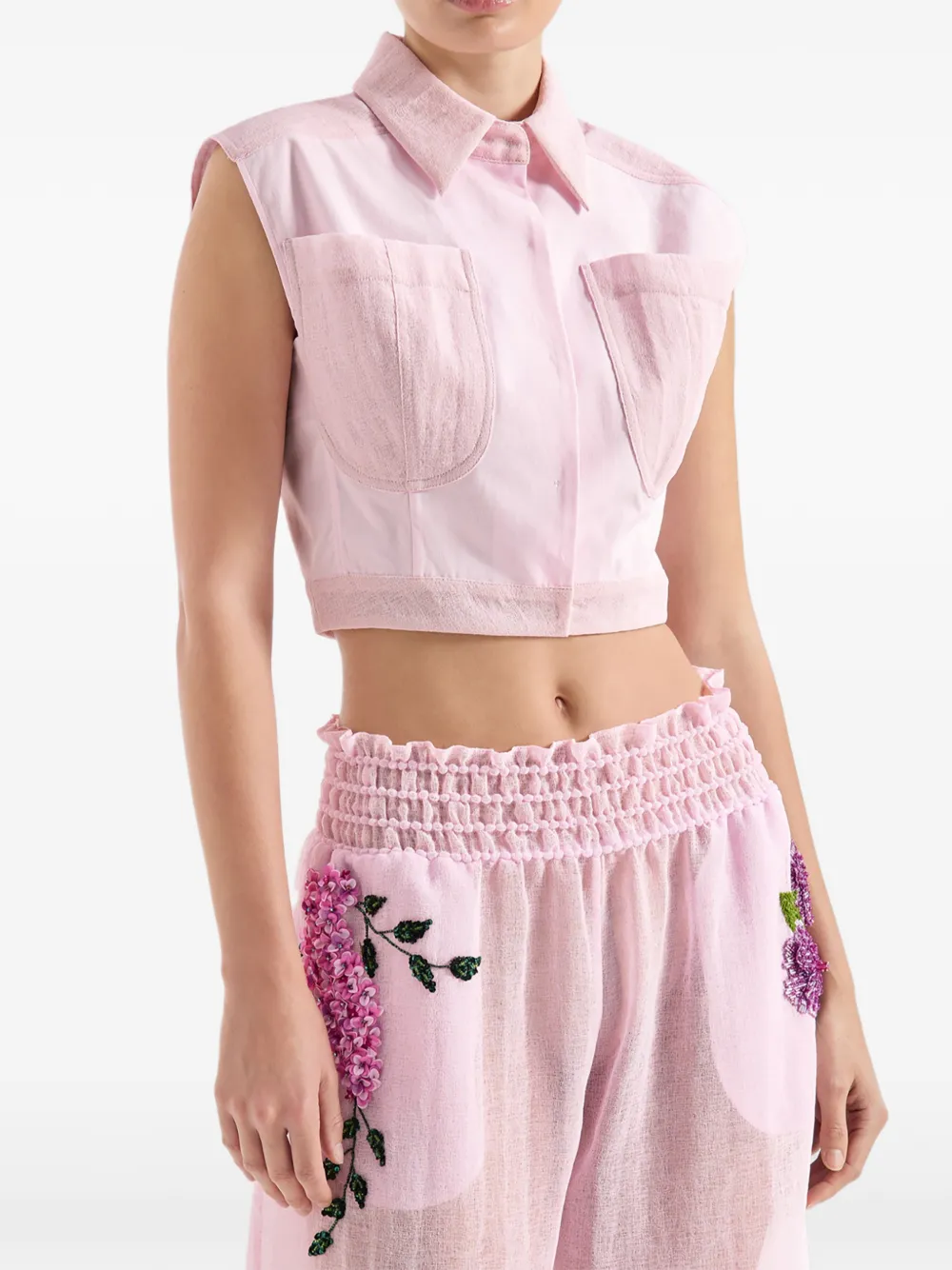 Genny Mouwloze top met zak Roze