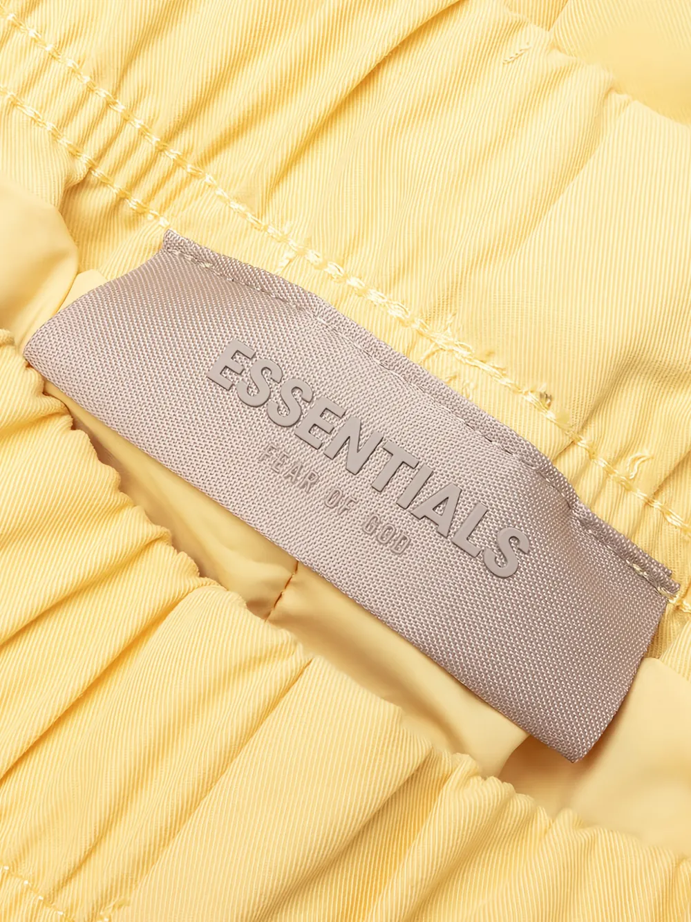 FEAR OF GOD ESSENTIALS KIDS Ruimvallende broek Geel