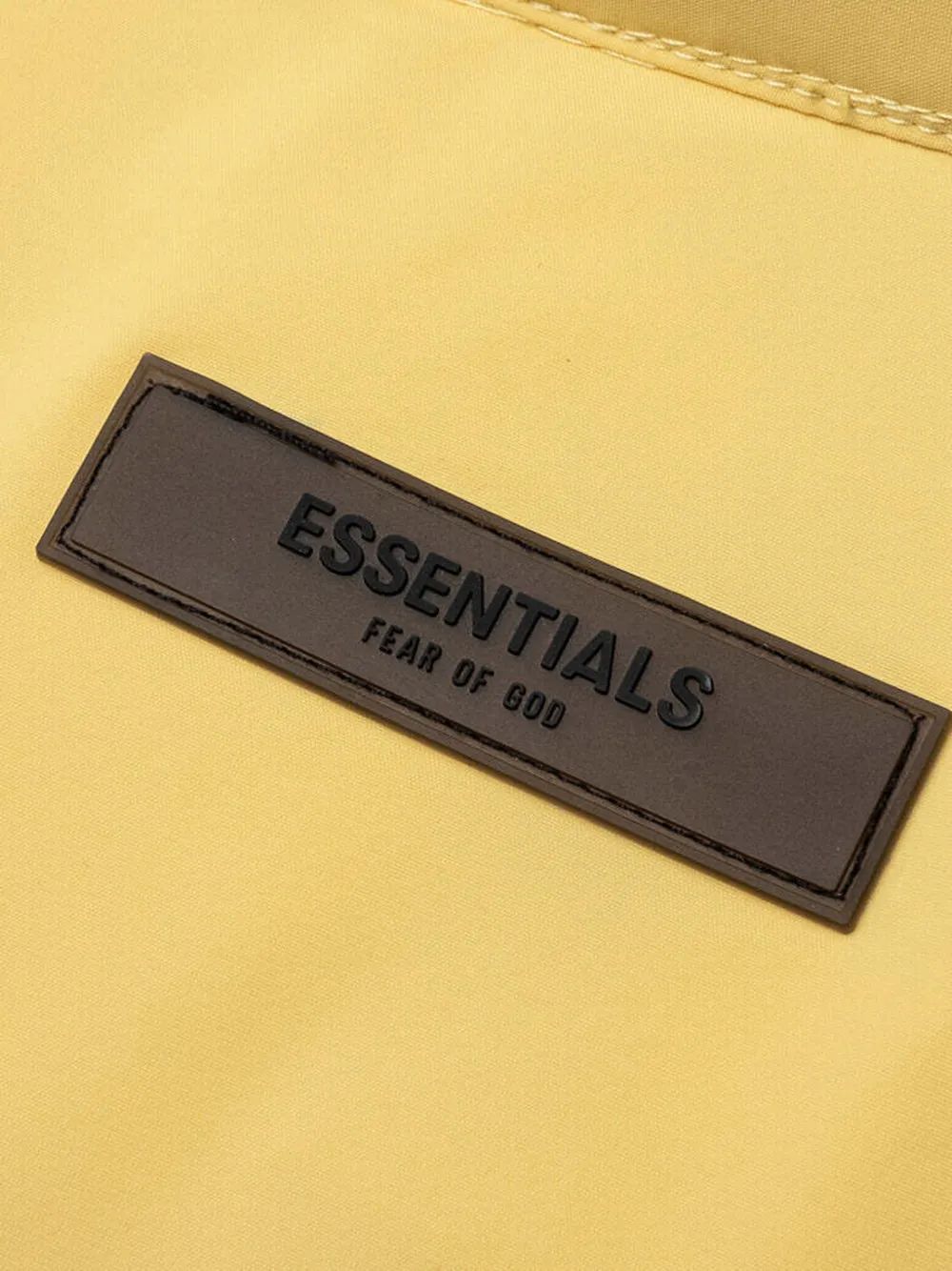 FEAR OF GOD ESSENTIALS KIDS Donsjack met rits Geel