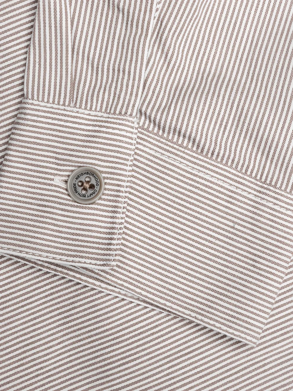 Neighborhood Poloshirt met gestreepte zak Beige