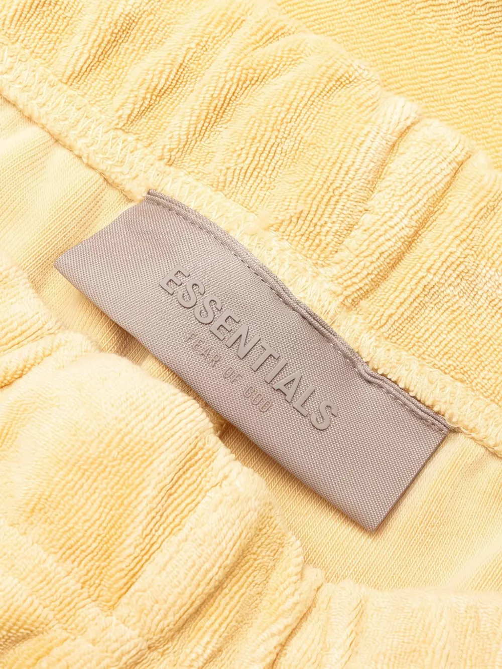 FEAR OF GOD ESSENTIALS Resort terry trousers Geel