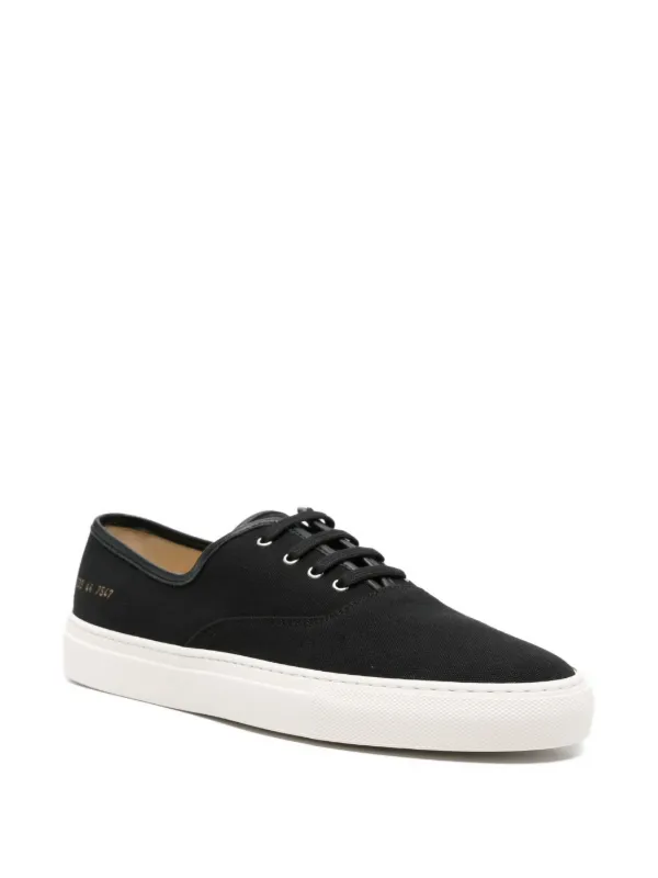 Common Projects Four Hole lace-up Sneakers | Black | FARFETCH ID