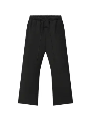 FEAR OF GOD ESSENTIALS Drawstring Pleated Trousers | Black | FARFETCH
