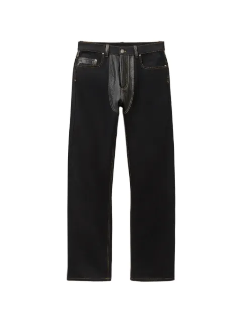 Versace jeans rectos de mezclilla y piel