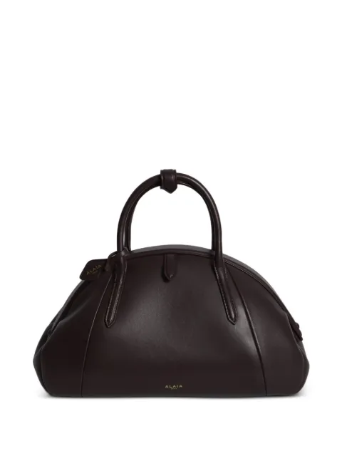 Alaïa skulpturel tote i læder med tophåndtag