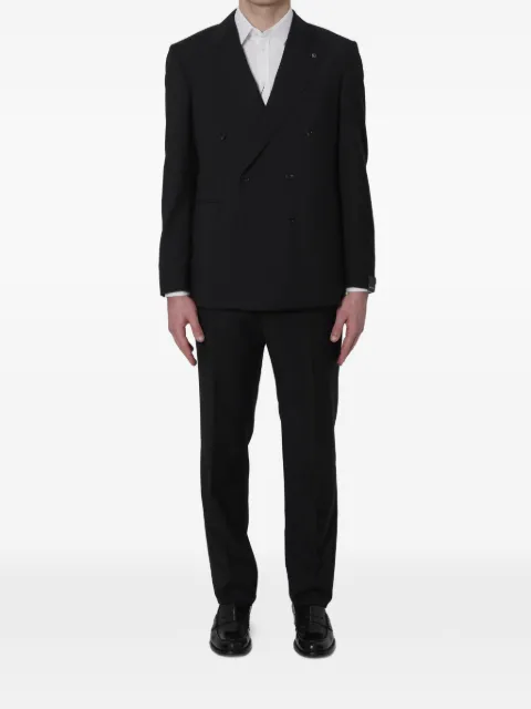 Tagliatore traje con doble botonadura