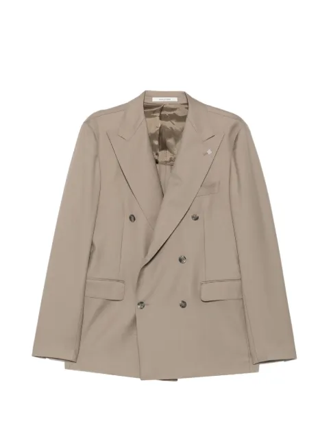 Tagliatore traje con doble botonadura