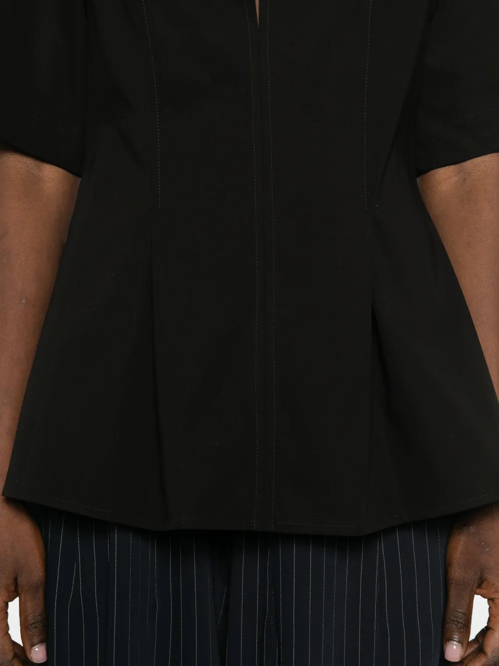 TOTEME Flared blouse met split Zwart