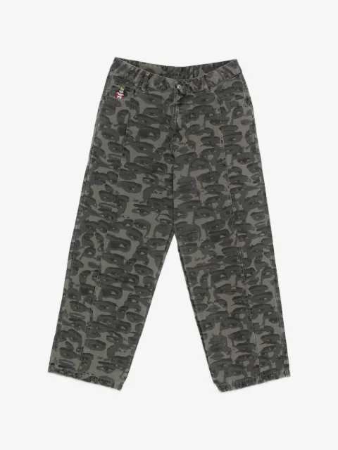 KidSuper jeans estampados