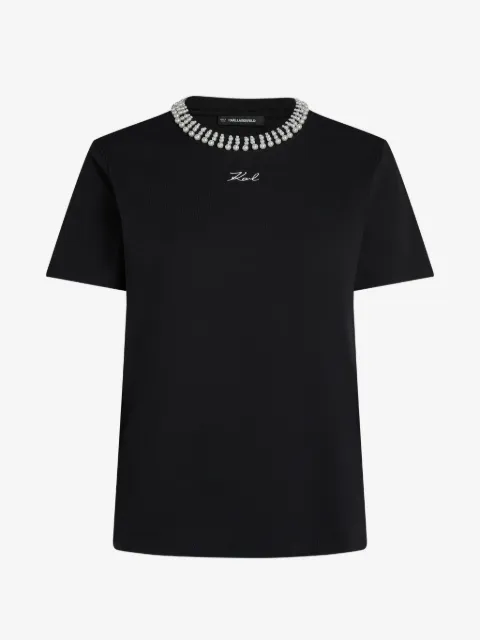 Karl Lagerfeld playera con perlas artificiales