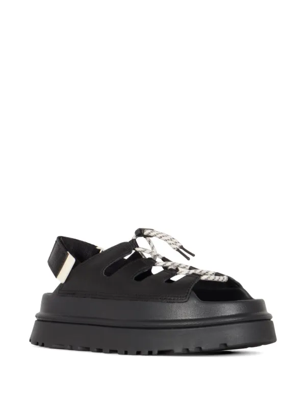 UGG GoldenGlow Toggle Sandals | Black | FARFETCH