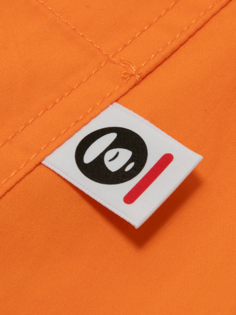 AAPE BY *A BATHING APE Shorts met logoprint Oranje