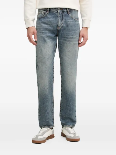Armani Exchange logo-embroidered stonewashed jeans
