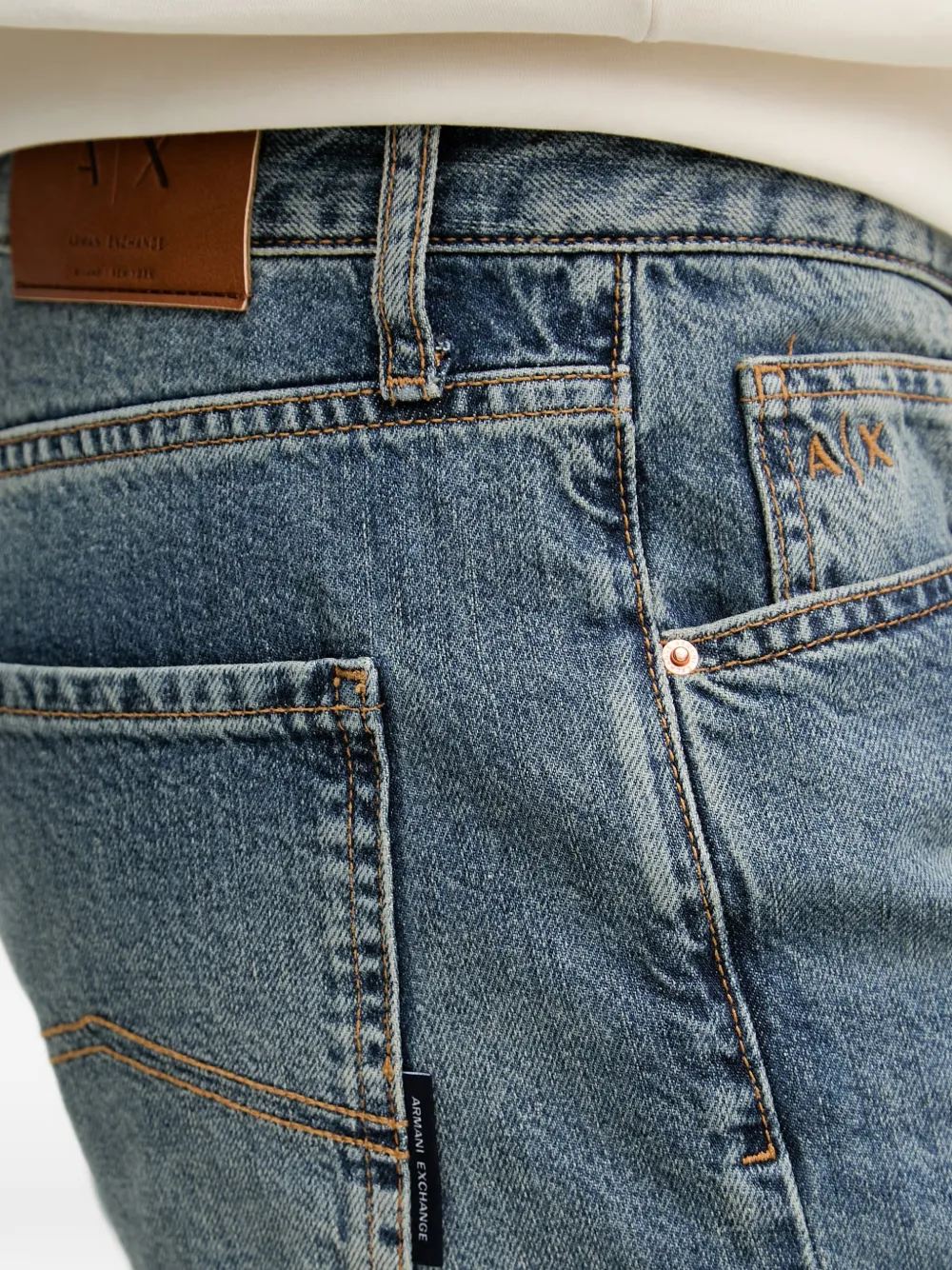 Armani Exchange Logo-embroidered Stonewashed Jeans In Blue
