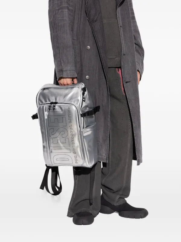 Diesel logo-print metallic-effect Backpack | Silver | FARFETCH