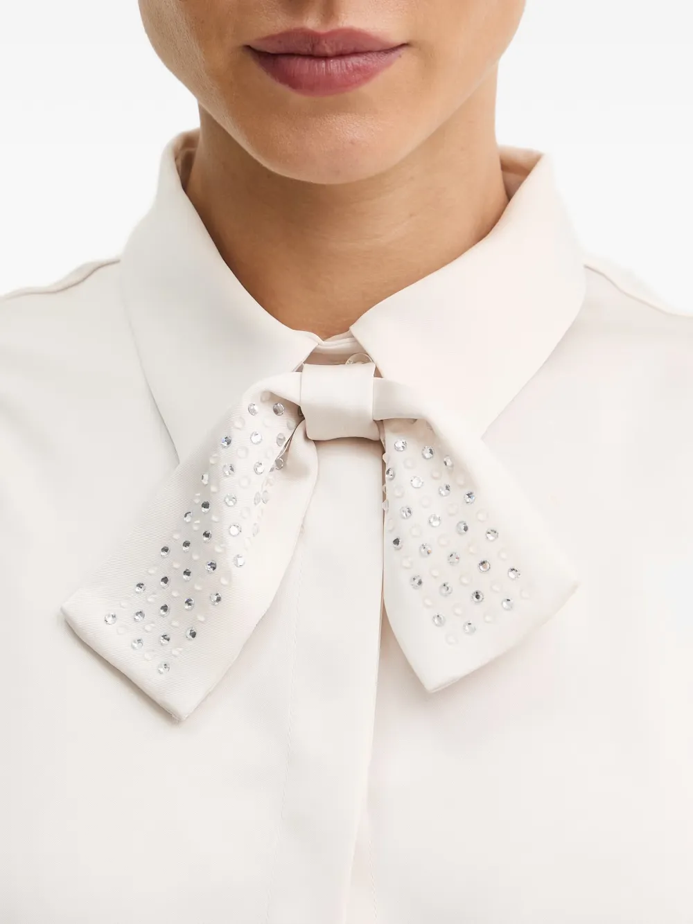SIMONA CORSELLINI Mouwloze blouse Beige
