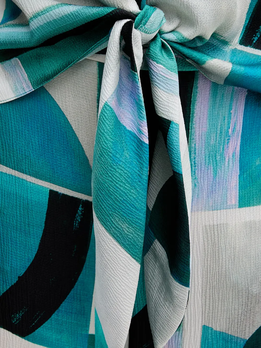 Joseph Ribkoff Top met gestrikte voorkant en abstracte print Blauw