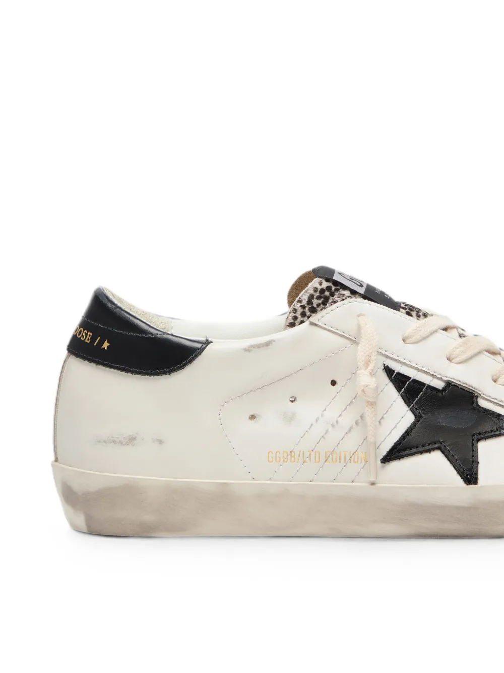 Golden Goose Super-Star LTD in white leather with black star and pony skin details sneakers