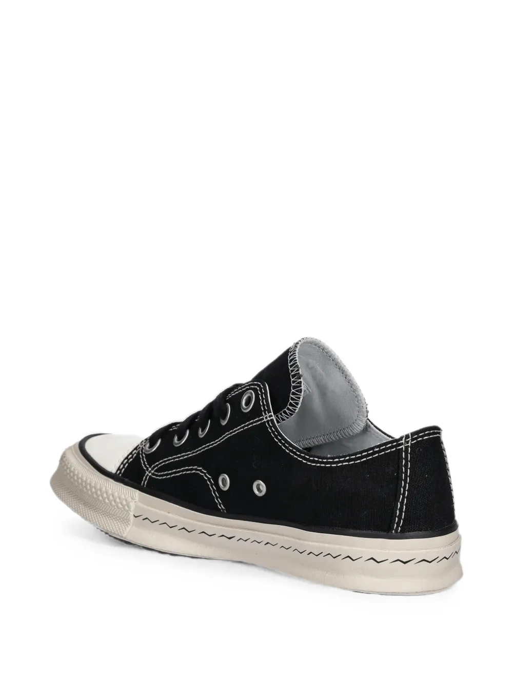 visvim Sneakers met contrasterende stiksels en logoprint Zwart