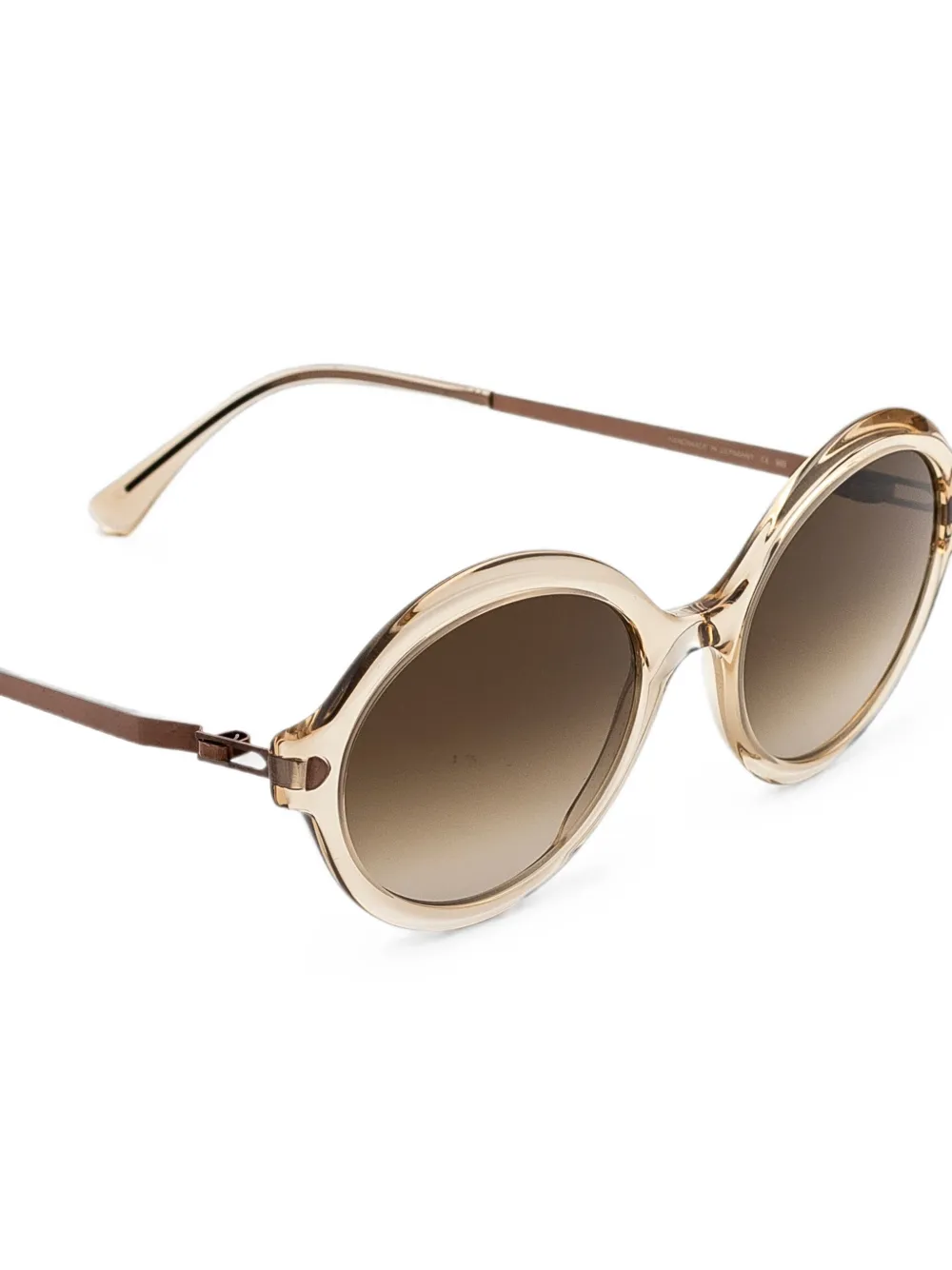 Mykita Noomi zonnebril met rond montuur Beige