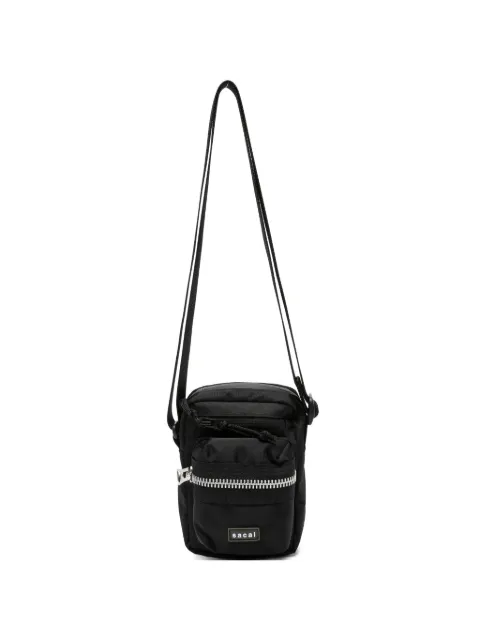 sacai multi-pocket messenger bag