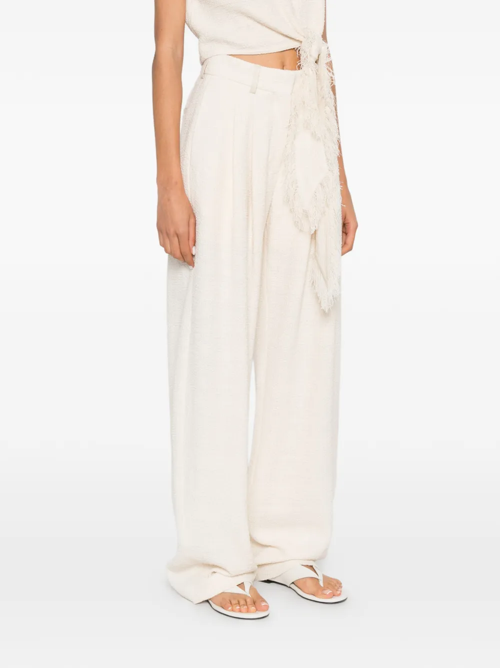 Nanushka Seka pantalon met toelopende pijpen Beige