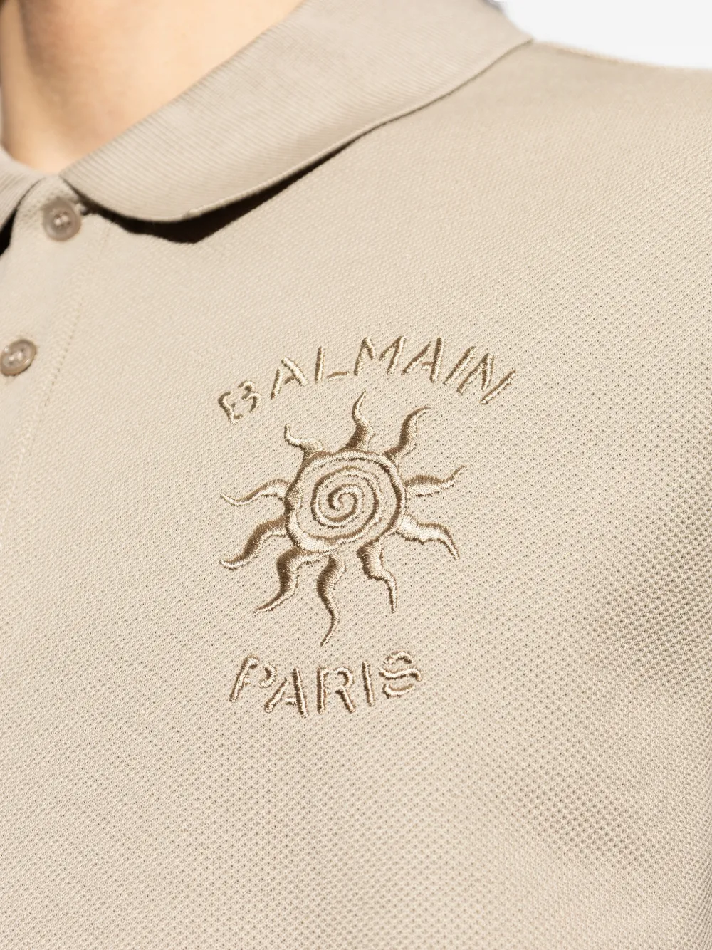 Balmain Piqué poloshirt met geborduurde zon Beige