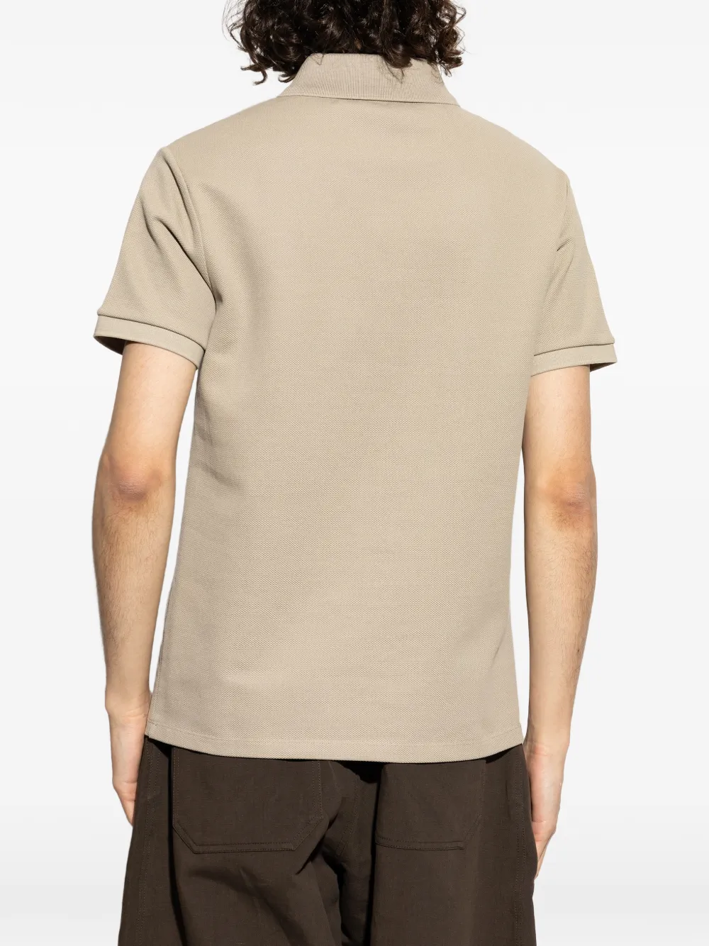 Balmain Piqué poloshirt met geborduurde zon Beige