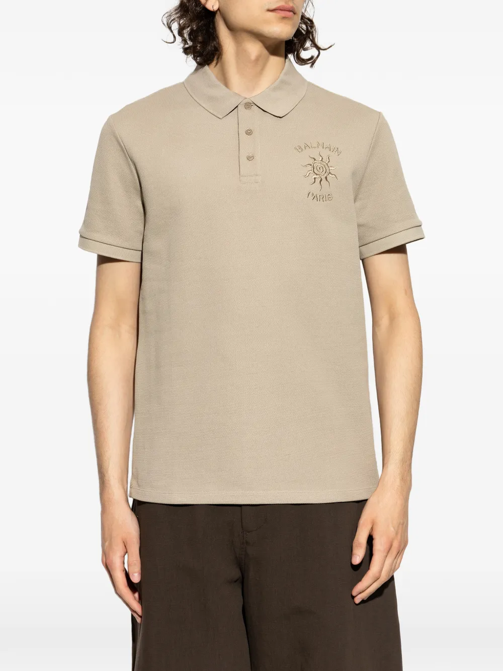 Balmain Piqué poloshirt met geborduurde zon Beige