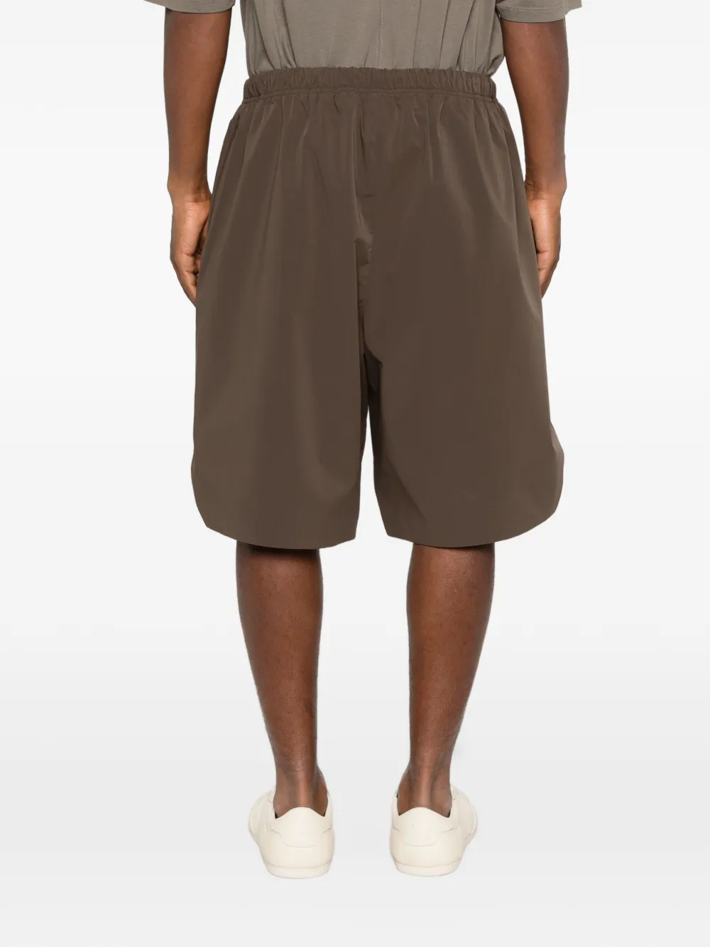 FEAR OF GOD ESSENTIALS Active Trace shorts met borduurwerk Bruin