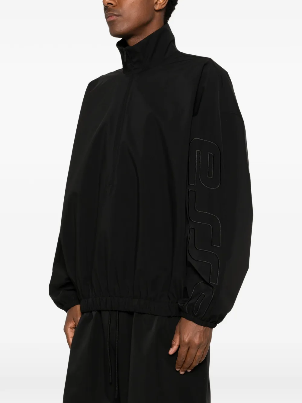 FEAR OF GOD ESSENTIALS Active Trace trainingsjack met halve rits Zwart