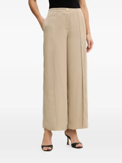 Armani Exchange pantalones con pinzas y abertura lateral