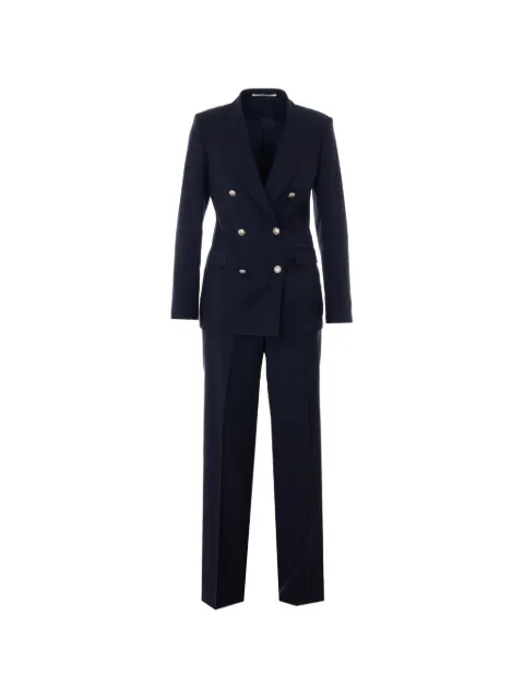 Tagliatore traje con doble botonadura